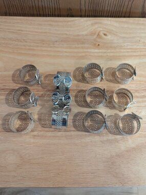 Vintage Set of 12 Silver (Plated ?) Napkin Rings-Bows & Filigree Like Detailing